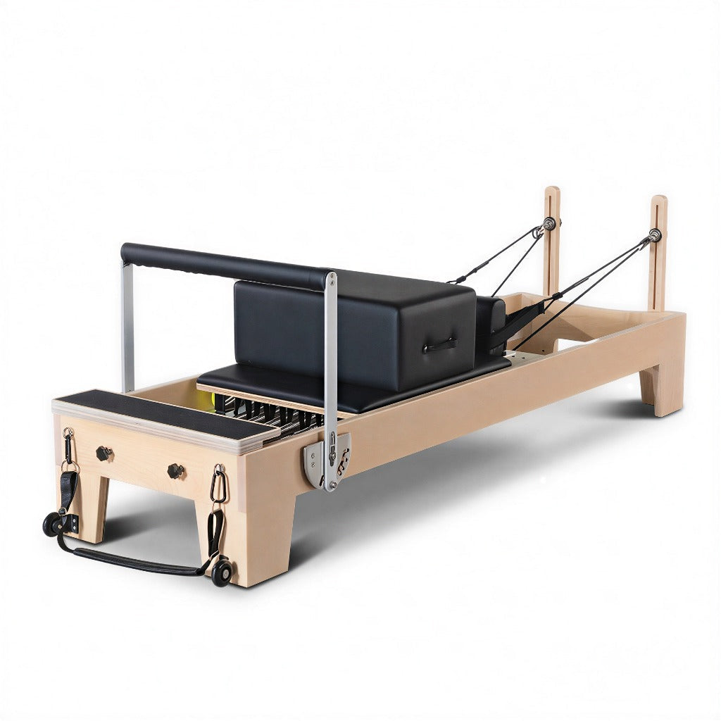 Oak wood pilates reformer with solid frame, front view
